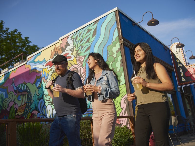 mktg-fr-20220531-alberta-arts-street-mural-people-walking-01